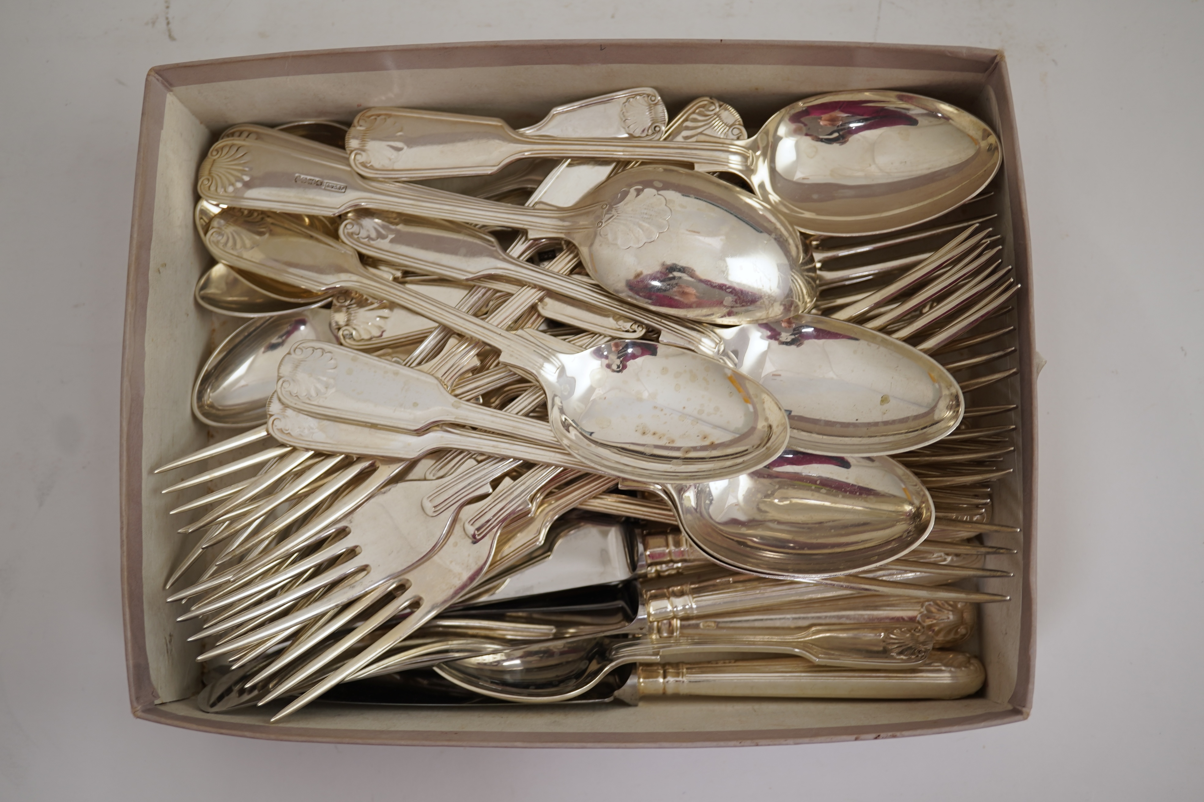 An Elizabeth II part canteen of silver fiddle, thread and shell pattern cutlery, by J B Chatterley & Sons Ltd